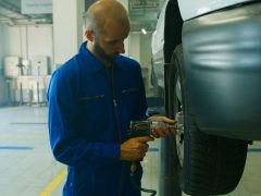 Impact wrench powered by an air compressor