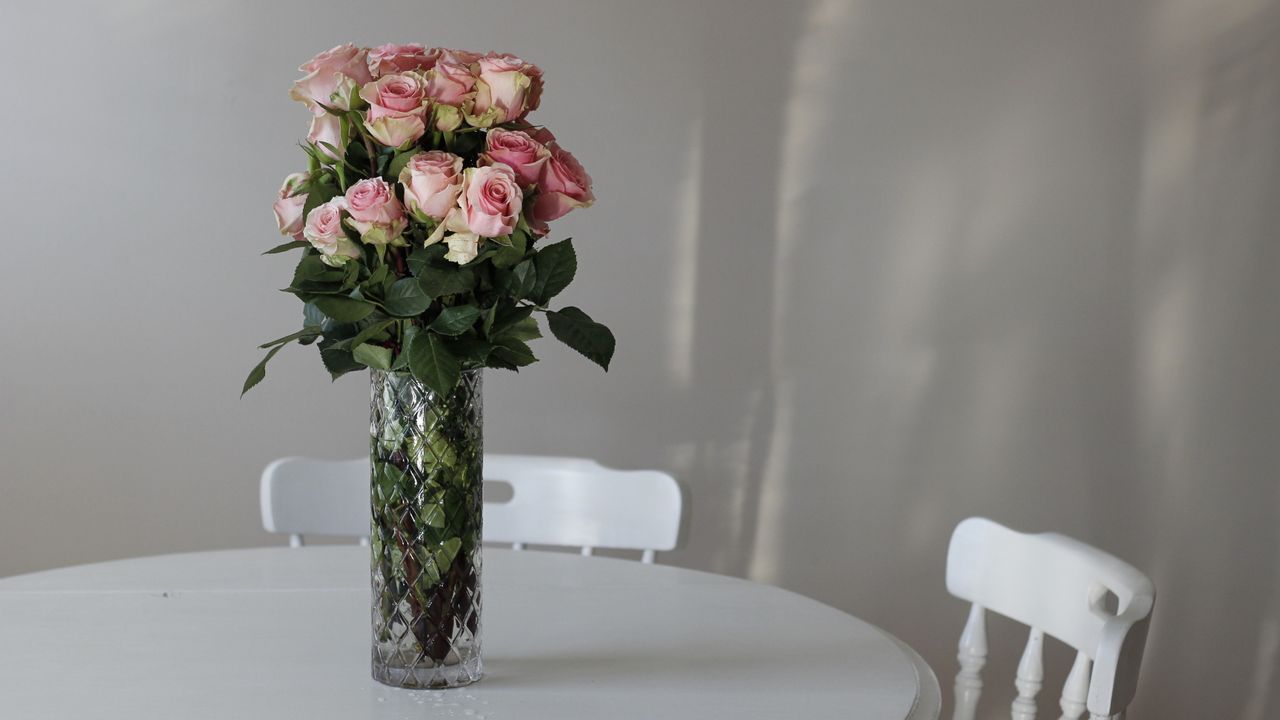 Fresh roses being cared for after delivery