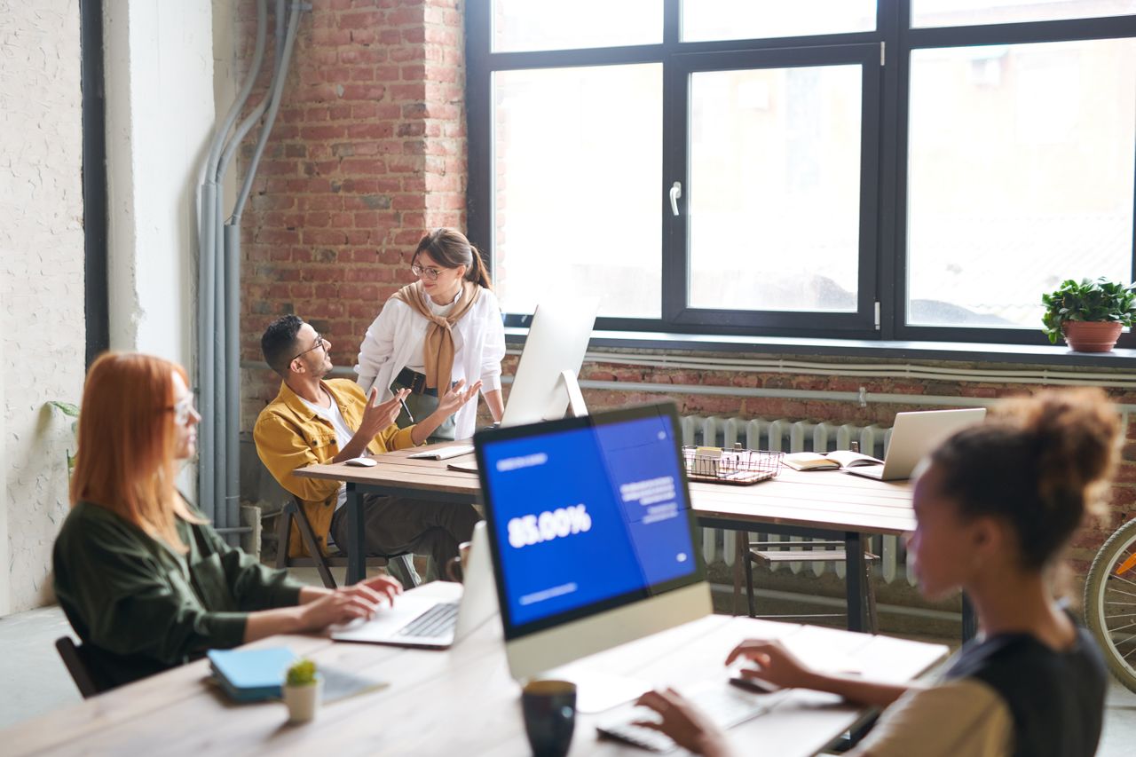 Business professionals discussing connectivity solutions and IT infrastructure